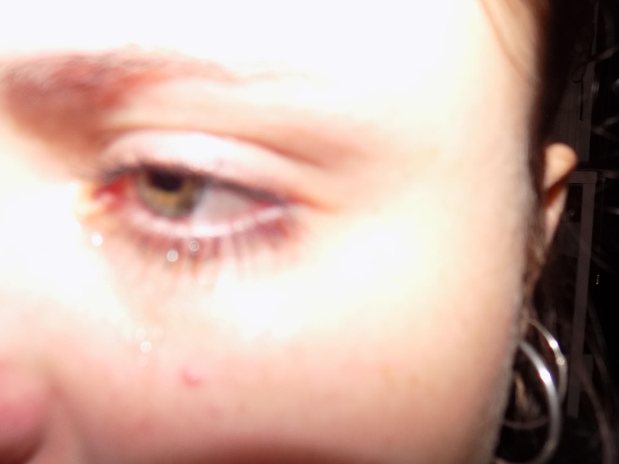 A close-up of an eye with makeup.